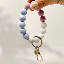 Load image into Gallery viewer, The Darling Effect - Hands-Free Silicone Keychain Wristlet - Periwinkle Skies
